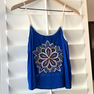 Flying Tomato cropped tank. Vivid blue with multi color stitch detail. Size L.